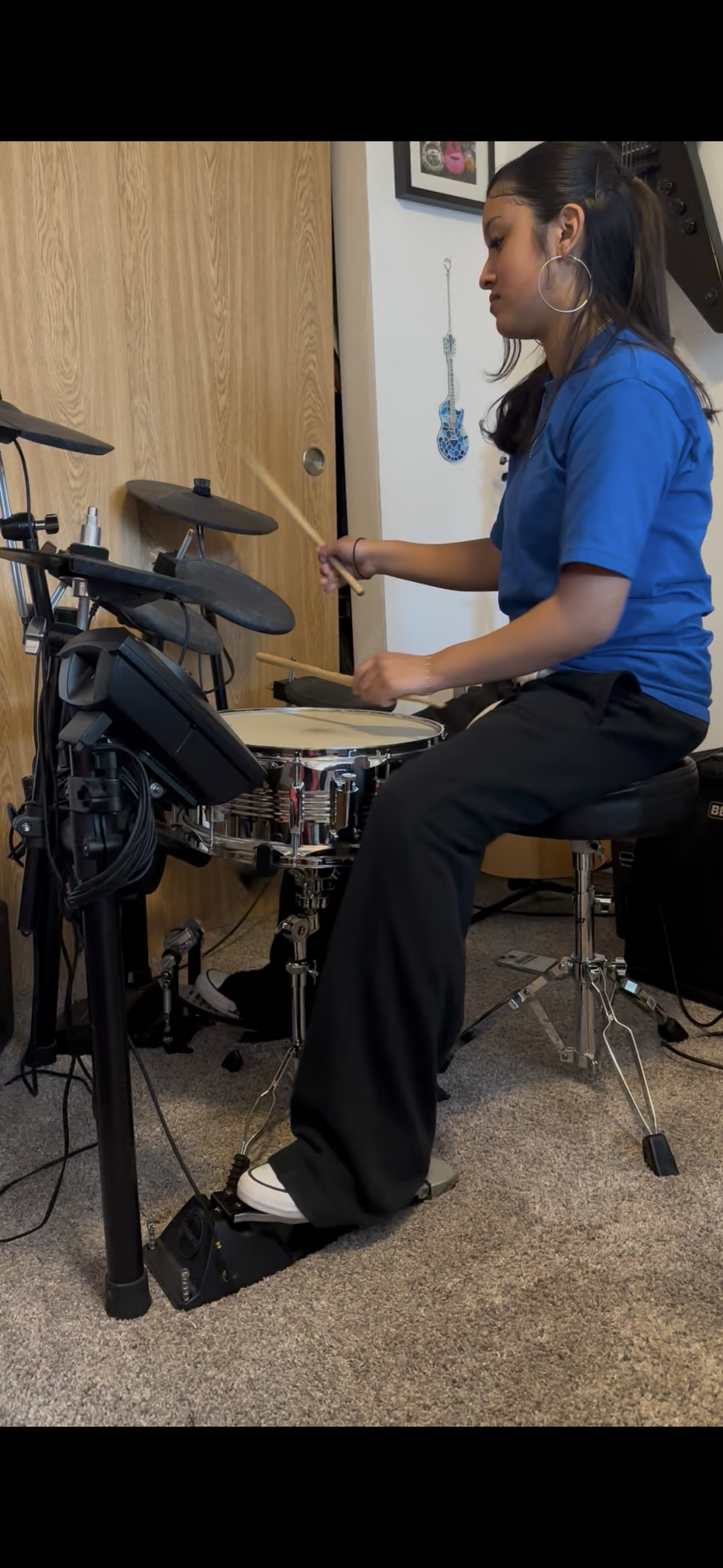 Student playing drums